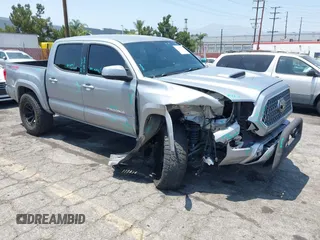 2019 Toyota Tacoma SR with VIN 3TMCZ5AN8KM261791, listed as a IAAI auction lot 42597882 with 44,858 mi miles and . Bid and sale history available at DreamBid. Image 1.