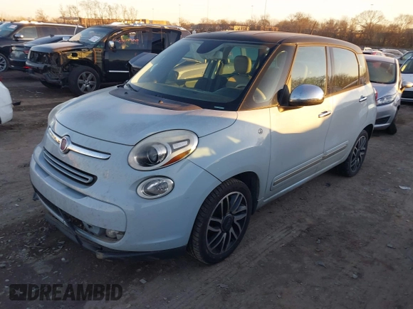 2015 FIAT 500L Lounge with VIN ZFBCFACH8FZ031314, listed as a IAAI auction lot 41392026 with 184,145 mi miles. Bid and sale history available at carsss.com. Image 2.