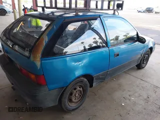 1990 Geo Metro z VIN 2C1MS2469L6015529, wystawiony jako IAAI lot #41902168 z przebiegiem 95 772 mil mil oraz . Historia ofert i sprzedaży dostępna na DreamBid. Obrazek 4.