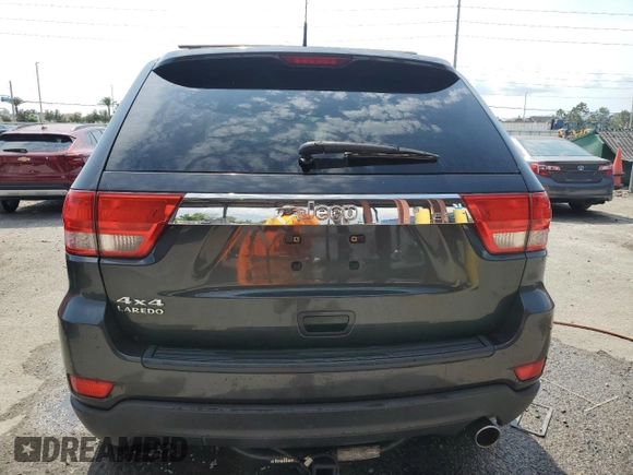 2011 Jeep Grand Cherokee Laredo z VIN 1J4RR4GG2BC518713, wystawiony jako Copart lot #55947995 z przebiegiem 119 783 mil mil oraz Szkoda całkowita • Salvage title. Historia ofert i sprzedaży dostępna na DreamBid. Obrazek 6.