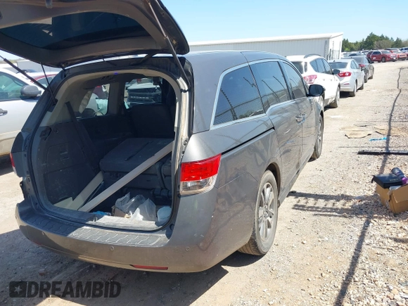 2015 Honda Odyssey Touring Elite with VIN 5FNRL5H98FB034700, listed as a IAAI auction lot 42019265 with 226,829 mi miles and . Bid and sale history available at DreamBid. Image 4.