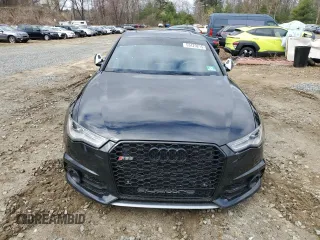 2016 Audi S6 Premium Plus z VIN WAUF2AFC0GN006581, wystawiony jako Copart lot #53429215 z przebiegiem 151 937 mil mil oraz Tytuł czysty. Historia ofert i sprzedaży dostępna na DreamBid. Obrazek 5.