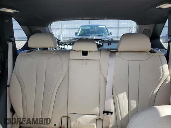2018 BMW X5 xDrive35i with VIN 5UXKR0C53J0X93705, listed as a Copart auction lot 51715435 with 106,677 mi miles and Salvage Title. Bid and sale history available at carsss.com. Image 10.