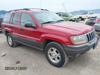 2001 Jeep Grand Cherokee Laredo with VIN 1J4GW48N51C732011, listed as a IAAI auction lot 42194017 with 195,716 mi miles and . Bid and sale history available at DreamBid. Image 1.