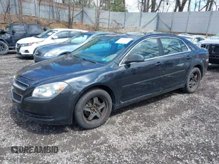 2011 Chevrolet Malibu 1LS with VIN 1G1ZB5E10BF293570, listed as a IAAI auction lot 42058205 with 92,316 mi miles and . Bid and sale history available at DreamBid. Image 2.
