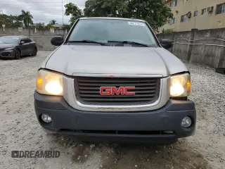 2005 GMC Envoy SLT with VIN 1GKDS13S352101385, listed as a Copart auction lot 89271025 with 165,670 mi miles and Salvage Title. Bid and sale history available at carsss.com. Image 5.
