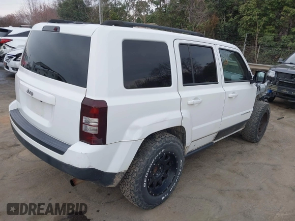2016 Jeep Patriot Sport SE with VIN 1C4NJPBA5GD700309, listed as a IAAI auction lot 41673265 with 123,977 mi miles and . Bid and sale history available at DreamBid. Image 4.