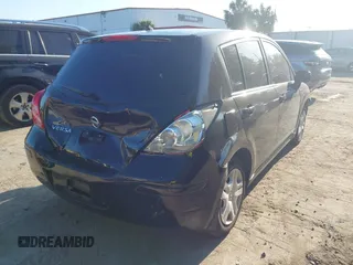 2012 Nissan Versa S with VIN 3N1BC1CP8CK201207, listed as a IAAI auction lot 42064101 with 206,514 mi miles. Bid and sale history available at carsss.com. Image 4.