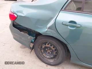 2010 Toyota Corolla with VIN 2T1BU4EEXAC379685, listed as a IAAI auction lot 41977194 with 158,850 mi miles and . Bid and sale history available at DreamBid. Image 6.