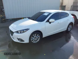 2014 Mazda 3 i Touring with VIN JM1BM1L77E1117166, listed as a IAAI auction lot 41336048 with 88,808 mi miles and . Bid and sale history available at DreamBid. Image 2.