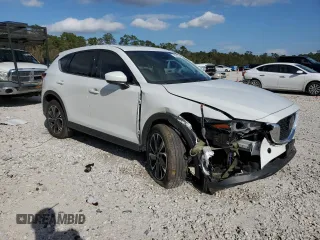 2023 Mazda CX-5 2.5 S Premium Package with VIN JM3KFBDM4P0217729, listed as a Copart auction lot 85883354 with 18,116 mi miles and Salvage Title. Bid and sale history available at carsss.com. Image 4.
