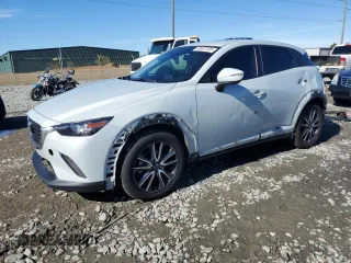 2018 Mazda CX-3 Touring with VIN JM1DKFC71J1305316, listed as a Copart auction lot 88087095 with 68,279 mi miles and Salvage Title. Bid and sale history available at carsss.com. Image 1.