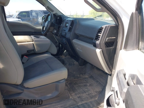 2018 Ford F-150 XL with VIN 1FTMF1CB1JKC58164, listed as a IAAI auction lot 42289514 with 57,075 mi miles and . Bid and sale history available at DreamBid. Image 5.