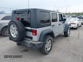 2008 Jeep Wrangler Unlimited X with VIN 1J4GA39108L510829, listed as a IAAI auction lot 42069589 with 108,696 mi miles and . Bid and sale history available at DreamBid. Image 4.