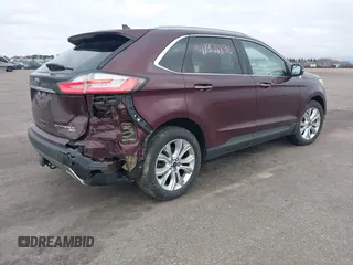 2020 Ford Edge Titanium z VIN 2FMPK4K91LBB56297, wystawiony jako IAAI lot #41938896 z przebiegiem 79 875 mil mil oraz . Historia ofert i sprzedaży dostępna na DreamBid. Obrazek 4.
