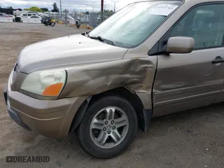 2004 Honda Pilot EX with VIN 2HKYF18594H523176, listed as a IAAI auction lot 41937743 with 310,344 mi miles. Bid and sale history available at carsss.com. Image 6.