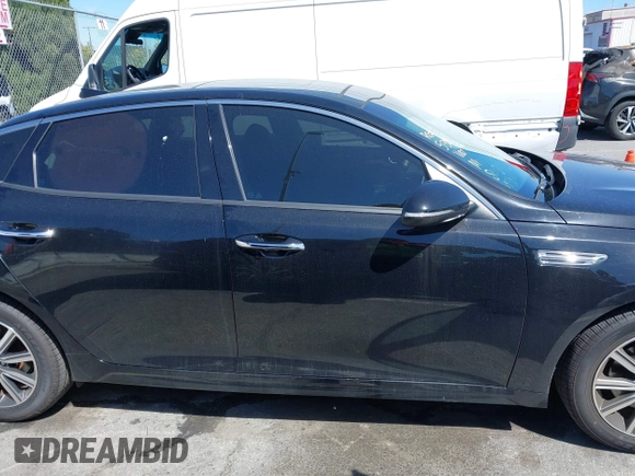 2019 Kia Optima LX with VIN 5XXGT4L34KG308177, listed as a IAAI auction lot 41919565 with 57,815 mi miles. Bid and sale history available at carsss.com. Image 14.