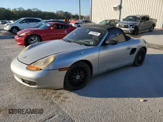 2000 Porsche Boxster z VIN WP0CA298XYU621944, wystawiony jako Copart lot #87532095 z przebiegiem Nie podano mil oraz Tytuł czysty. Historia ofert i sprzedaży dostępna na DreamBid. Obrazek 1.