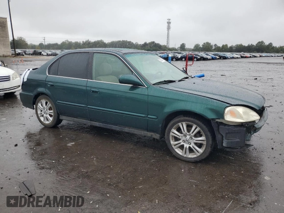 2000 Honda Civic EX with VIN 1HGEJ8641YL022645, listed as a Copart auction lot 73574474 with 285,937 mi miles and Salvage Title. Bid and sale history available at carsss.com. Image 4.