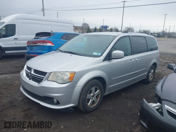 2011 Dodge Grand Caravan Crew with VIN 2D4RN5DGXBR678747, listed as a IAAI auction lot 41899883 with 196,100 mi miles and . Bid and sale history available at DreamBid. Image 2.