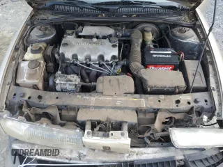 1997 Saturn SL with VIN 1G8ZH5285VZ365951, listed as a Copart auction lot 70902264 with 104,781 mi miles and Salvage Title. Bid and sale history available at carsss.com. Image 13.