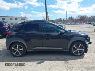 2020 Hyundai Kona Limited with VIN KM8K3CA54LU403886, listed as a IAAI auction lot 41853262 with 144,044 mi miles and . Bid and sale history available at DreamBid. Image 14.