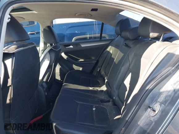 2014 Volkswagen Jetta TDI w/Premium with VIN 3VW3L7AJ9EM383295, listed as a IAAI auction lot 41983218 with 105,077 mi miles and . Bid and sale history available at DreamBid. Image 8.