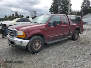 1999 Ford F-250 XL with VIN 1FTNX20L1XEC32594, listed as a Copart auction lot 49801605 with 239,103 mi miles and Salvage title. Bid and sale history available at DreamBid. Image 1.
