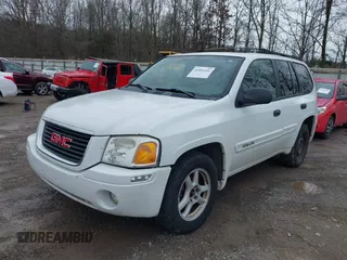 2004 GMC Envoy SLE with VIN 1GKDT13SX42357048, listed as a IAAI auction lot 41601126 with 304,101 mi miles. Bid and sale history available at carsss.com. Image 2.