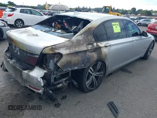 2009 BMW 7 Series 750Li z VIN WBAKB83569CY58462, wystawiony jako IAAI lot #40134644 z przebiegiem Nie podano mil oraz . Historia ofert i sprzedaży dostępna na DreamBid. Obrazek 4.