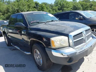 2005 Dodge Dakota SLT with VIN 1D7HE48N85S330207, listed as a IAAI auction lot 42632279 with 196,319 mi miles and . Bid and sale history available at DreamBid. Image 1.