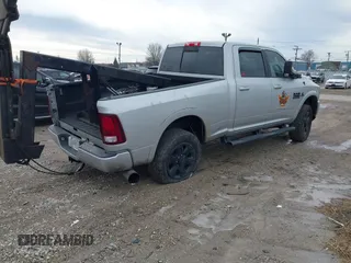 2017 Ram 2500 Laramie with VIN 3C6UR5FL8HG745387, listed as a IAAI auction lot 41153902 with 130,509 mi miles. Bid and sale history available at carsss.com. Image 4.