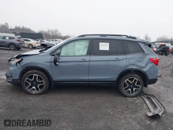 2022 Honda Passport Elite z VIN 5FNYF8H06NB015583, wystawiony jako IAAI lot #41633925 z przebiegiem 49 738 mil mil oraz . Historia ofert i sprzedaży dostępna na DreamBid. Obrazek 14.