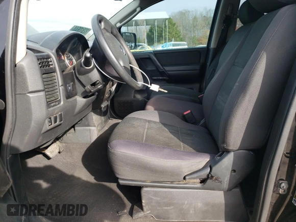 2010 Nissan Titan XE with VIN 1N6AA0EJ1AN323185, listed as a Copart auction lot 82813644 with 154,493 mi miles and Clean Title. Bid and sale history available at carsss.com. Image 7.
