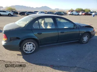 1996 Saturn SL with VIN 1G8ZK5272TZ137198, listed as a Copart auction lot 72446614 with 99,586 mi miles and Salvage title. Bid and sale history available at DreamBid. Image 3.
