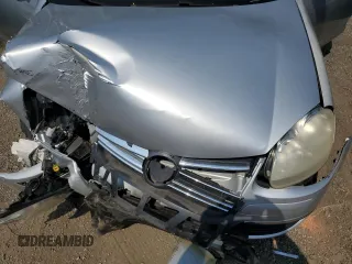 2007 Volkswagen Jetta Wolfsburg Edition z VIN 3VWEF71K07M168433, wystawiony jako Copart lot #60796705 z przebiegiem Nie podano mil oraz Szkoda całkowita • Salvage title. Historia ofert i sprzedaży dostępna na DreamBid. Obrazek 11.