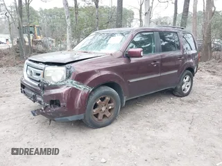 2010 Honda Pilot Touring with VIN 5FNYF4H9XAB040715, listed as a IAAI auction lot 41807334 with 262,786 mi miles and . Bid and sale history available at carsss.com. Image 23.