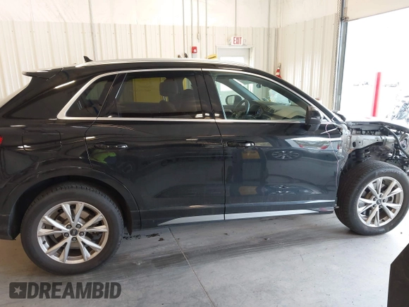 2021 Audi Q3 S line Premium Plus with VIN WA1EECF32M1054629, listed as a IAAI auction lot 41588322 with 33,385 mi miles and . Bid and sale history available at DreamBid. Image 14.