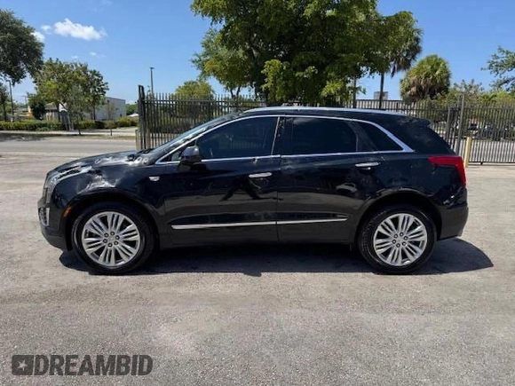 2018 Cadillac XT5 Premium Luxury FWD with VIN 1GYKNERS6JZ139813, listed as a Copart auction lot 65519875 with 96,567 mi miles and Non repairable. Bid and sale history available at DreamBid. Image 12.