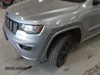 2018 Jeep Grand Cherokee Laredo E with VIN 1C4RJFAG7JC203793, listed as a IAAI auction lot 42585072 with 263,987 mi miles and . Bid and sale history available at DreamBid. Image 6.