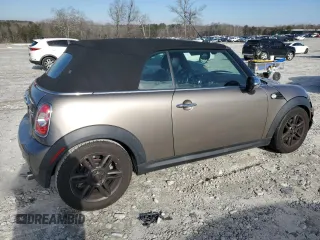2011 MINI Convertible with VIN WMWZN3C53BT133576, listed as a Copart auction lot 87543835 with 69,999 mi miles and Salvage title. Bid and sale history available at DreamBid. Image 3.