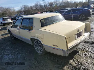 1990 Cadillac DeVille z VIN 1G6CD5333L4256377, wystawiony jako Copart lot #42613635 z przebiegiem 136 754 mil mil oraz Szkoda całkowita • Salvage title. Historia ofert i sprzedaży dostępna na DreamBid. Obrazek 2.