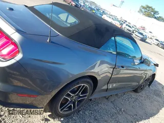 2021 Ford Mustang EcoBoost z VIN 1FATP8UH3M5105279, wystawiony jako IAAI lot #41712821 z przebiegiem 99 760 mil mil oraz . Historia ofert i sprzedaży dostępna na DreamBid. Obrazek 13.