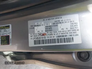 2014 Mazda 5 Sport with VIN JM1CW2BL6E0164195, listed as a IAAI auction lot 42455158 with 155,007 mi miles and . Bid and sale history available at DreamBid. Image 9.