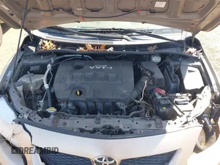 2009 Toyota Corolla with VIN 1NXBU40E09Z144942, listed as a IAAI auction lot 42051178 with 101,564 mi miles and . Bid and sale history available at DreamBid. Image 10.