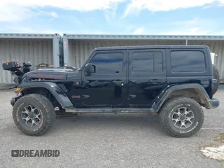 2022 Jeep Wrangler Unlimited Rubicon with VIN 1C4HJXFN2NW134024, listed as a IAAI auction lot 42248188 with 41,899 mi miles and . Bid and sale history available at DreamBid. Image 14.