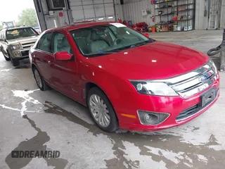 2012 Ford Fusion Hybrid с VIN 3FADP0L34CR176501, выставлен на аукционе IAAI как лот 42239687 с пробегом 86 648 миль миль и . История ставок и продаж доступна на DreamBid. Изображение 1.
