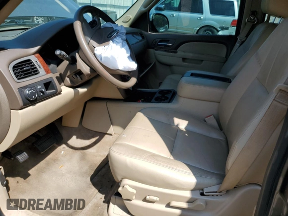 2013 Chevrolet Suburban LT with VIN 1GNSCJE07DR104489, listed as a Copart auction lot 60844784 with 185,420 mi miles and Salvage Title. Bid and sale history available at carsss.com. Image 7.