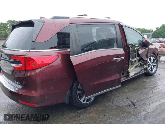 2021 Honda Odyssey Touring with VIN 5FNRL6H88MB006938, listed as a IAAI auction lot 42367022 with 63,280 mi miles and . Bid and sale history available at DreamBid. Image 16.