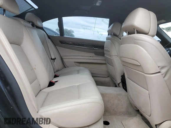 2013 BMW 7 Series 750Li z VIN WBAYE8C57DD133232, wystawiony jako Copart lot #86054494 z przebiegiem 118 438 mil mil oraz Szkoda całkowita • Salvage title. Historia ofert i sprzedaży dostępna na DreamBid. Obrazek 10.